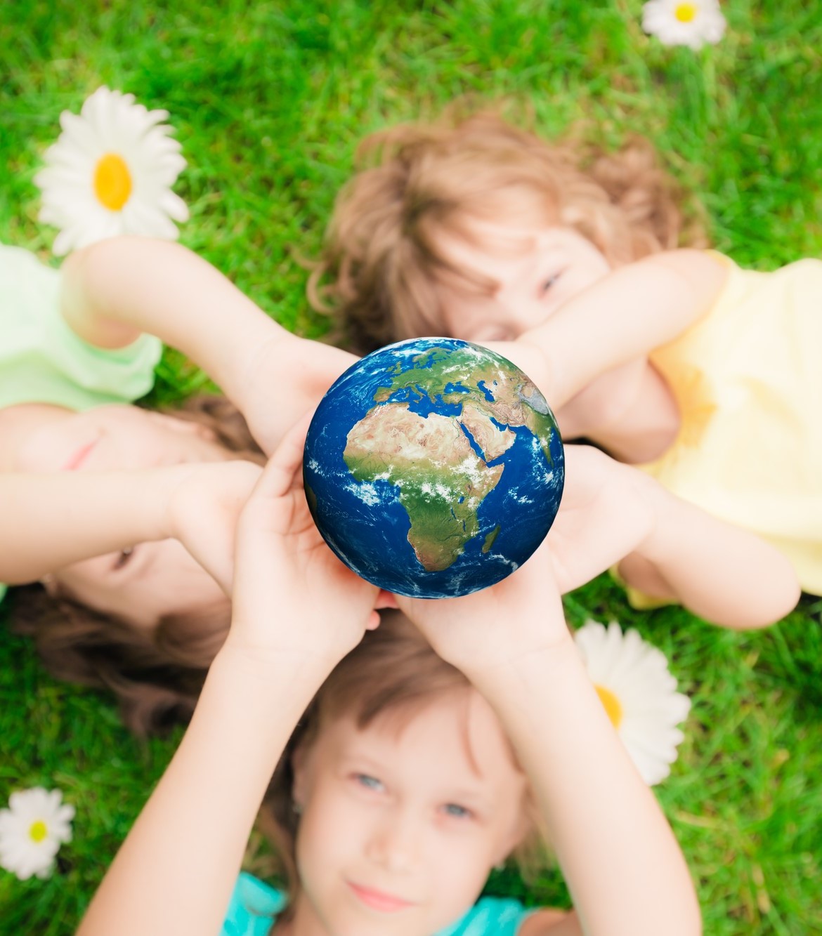 children holding earth